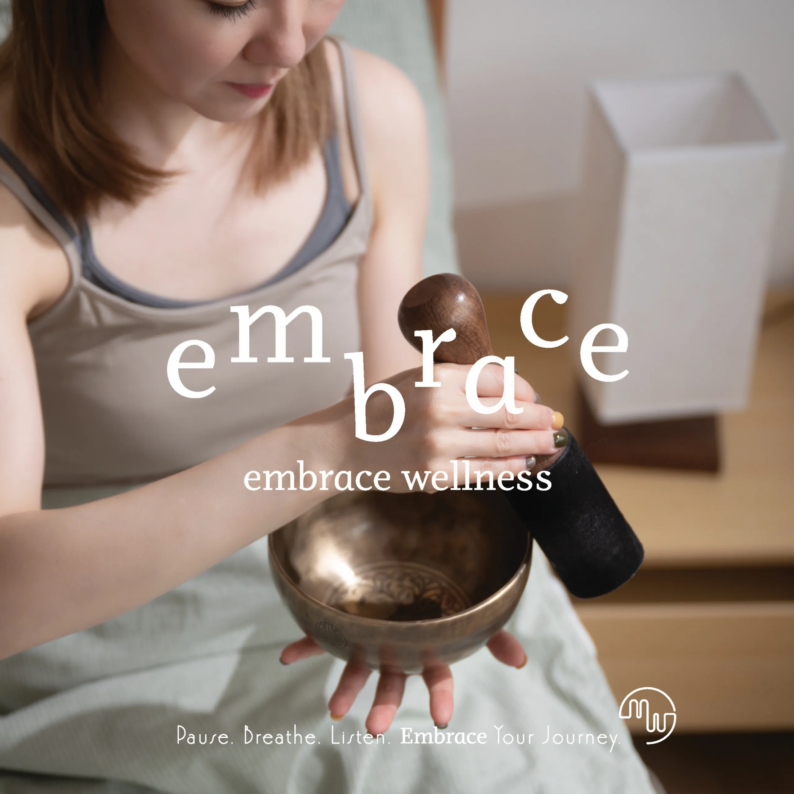 Manlee W holding a Tibetan singing bowl – Embrace Wellness sound healer and holistic wellness practitioner Newbury