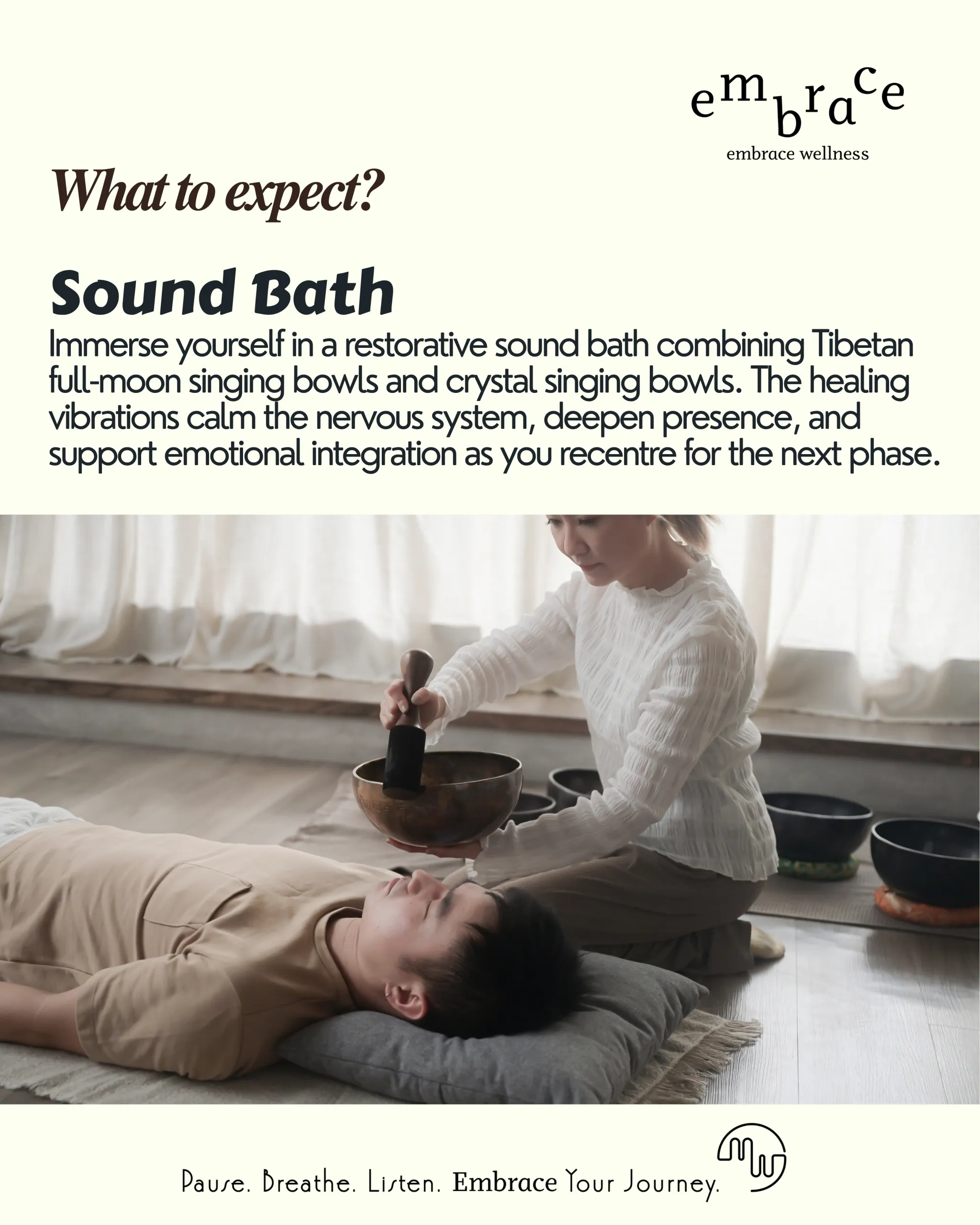 Sound healer Manlee W performing Tibetan singing bowl therapy on participant lying down during a private sound bath session